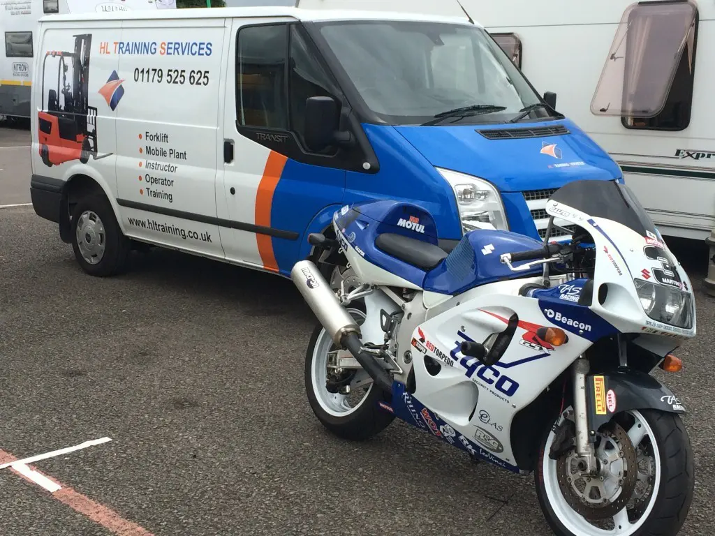 Suzuki GSXR 600 and wrapped Ford Transit